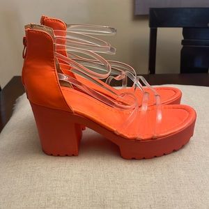 Very cool looking platform shoes with open toe. Size 8